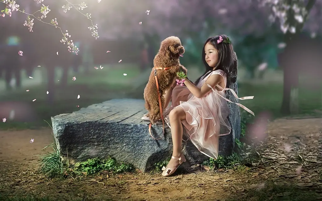 Lovely Asian little girl and dog friends